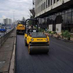 Urgent-asphalt-repair-work-is-being-done-on-a-large.jpg